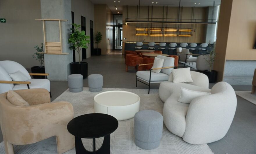 Sophisticated lounge featuring chic modern furniture, ideal for upscale interiors. - Photo by Sergio J. Ávila on Pexels